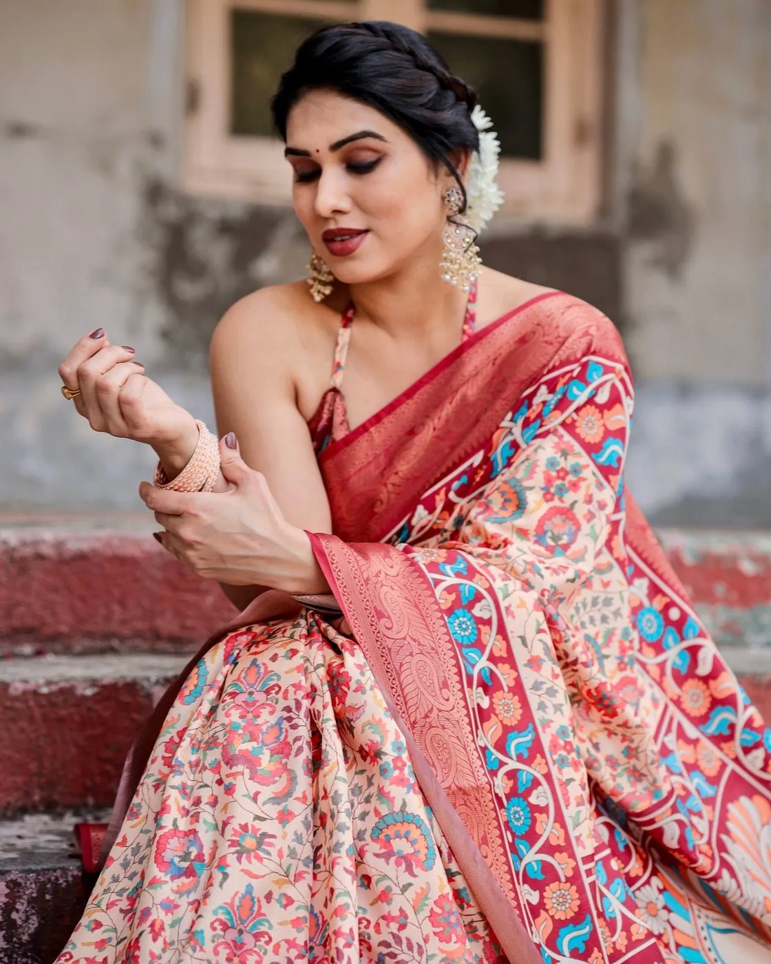 Beige and Coral Tussar Silk Saree with Intricate Floral Prints and Artistic Pallu