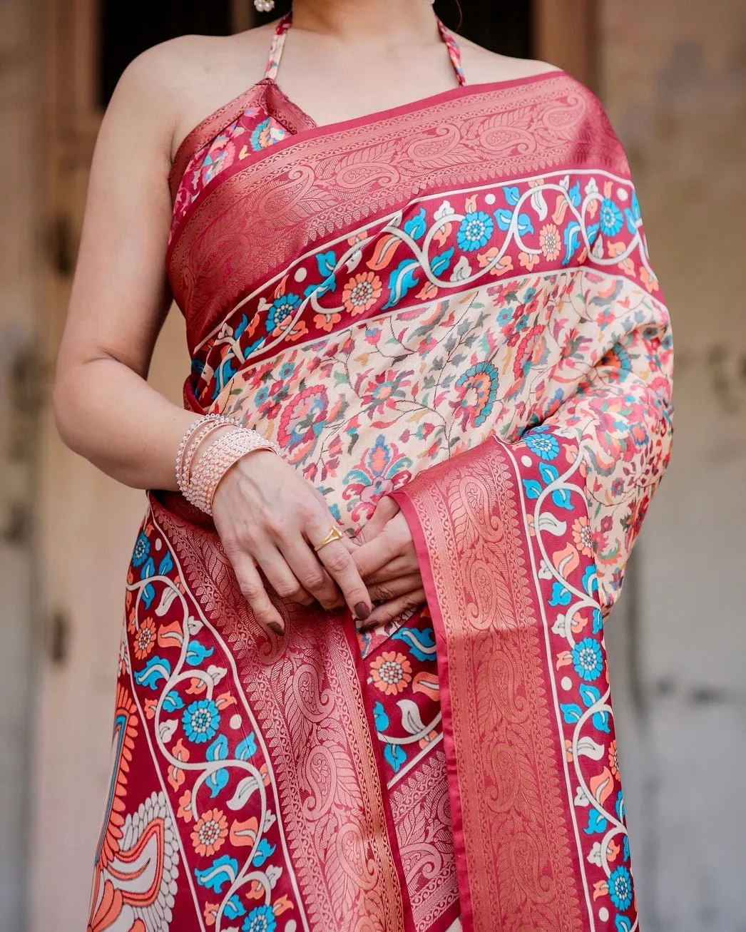 Beige and Coral Tussar Silk Saree with Intricate Floral Prints and Artistic Pallu
