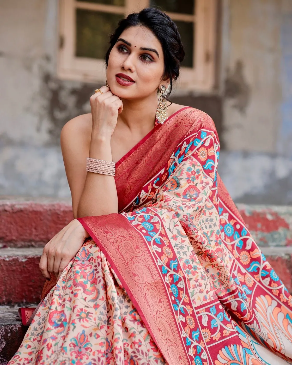 Beige and Coral Tussar Silk Saree with Intricate Floral Prints and Artistic Pallu