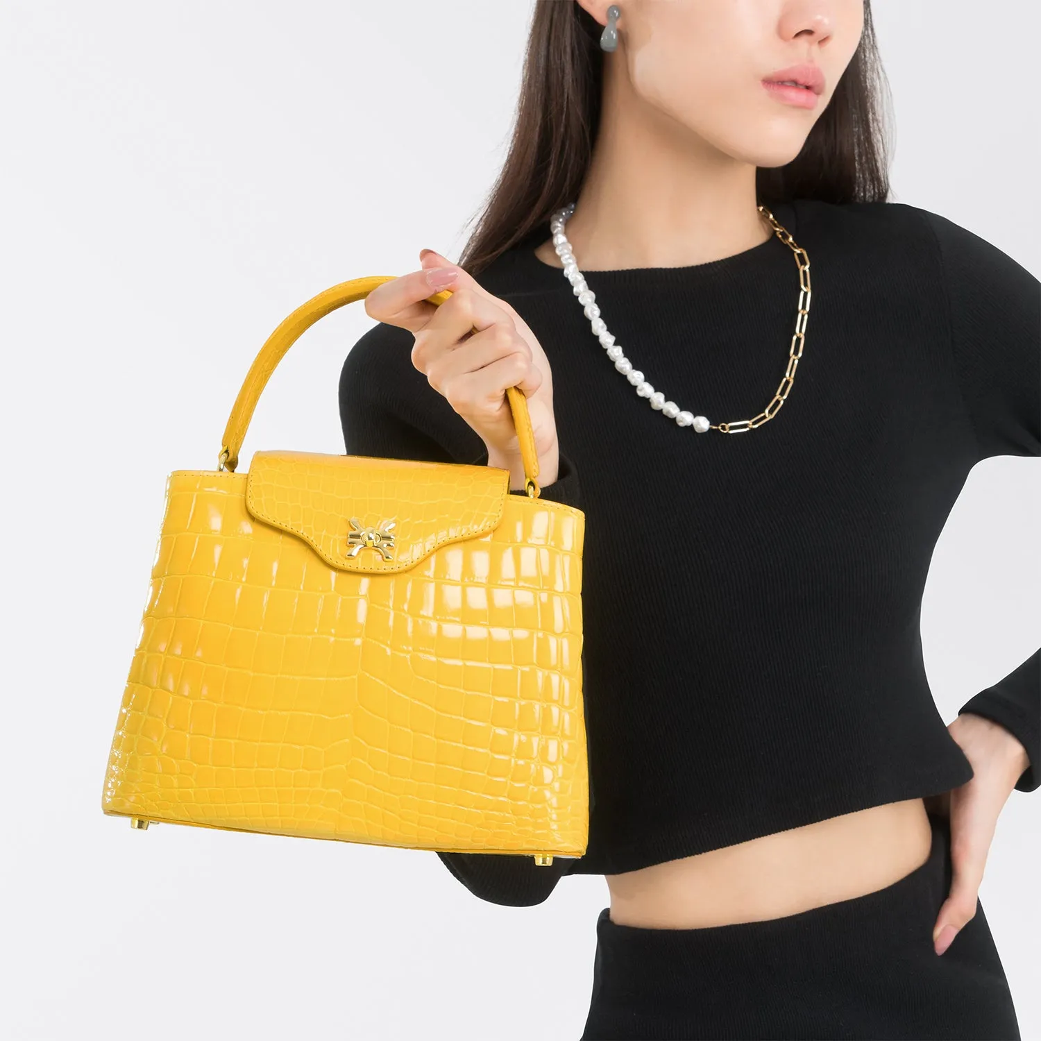 CREST FLAP HANDBAG