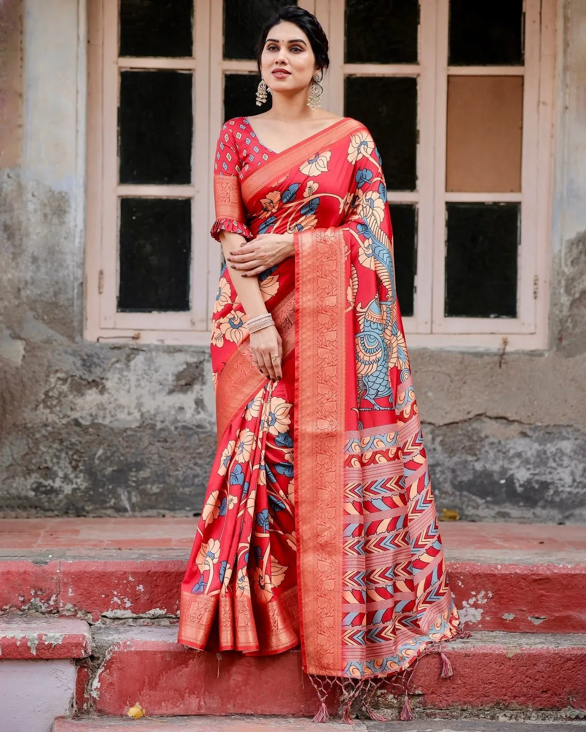 Vibrant Red Tussar Silk Saree with Bold Floral Motifs and Chevron Patterned Pallu